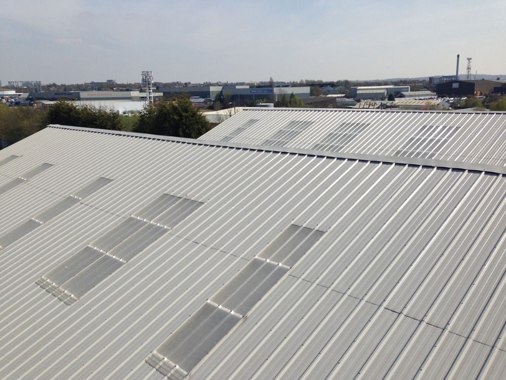 Replacement profiled sheet roof with in-plane rooflights