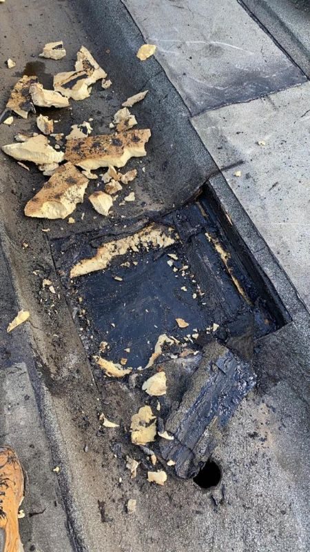 Failed gutter and blocked outlet found during a roof inspection, before the works