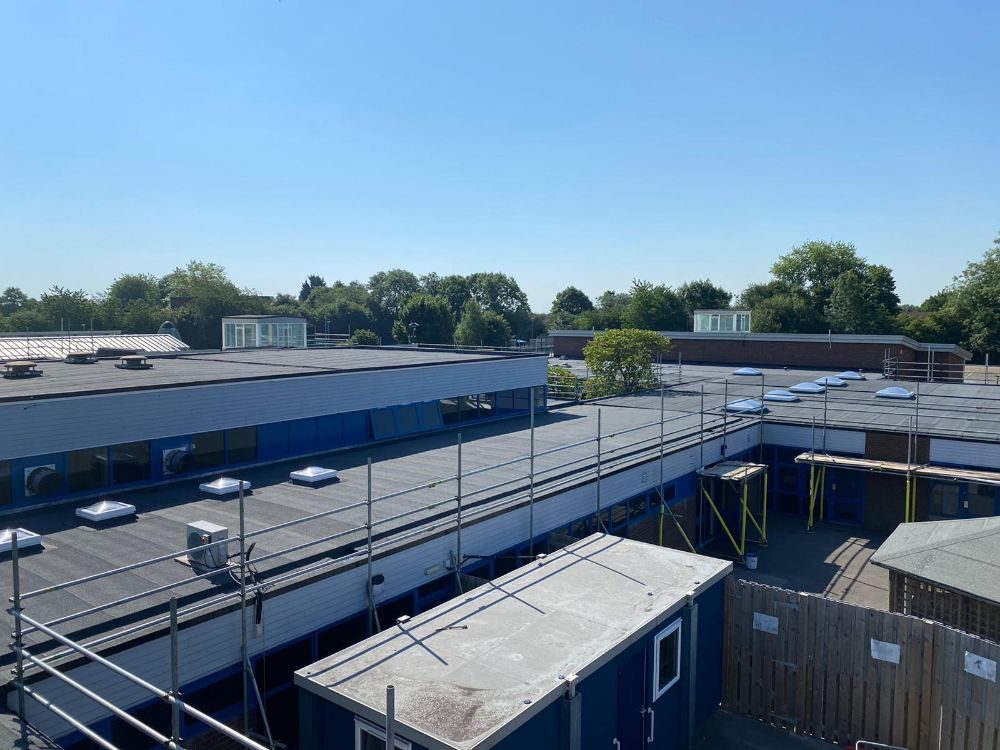 Completed school roof with site cabins and scaffold below, Windmill Primary School, Telford